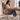 Person using a Lurpes high-back executive chair at a home-office desk
