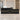Modern Reception Desk with Cable Management, Fluted Front & LED Lighting for Office Lobby