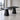 Charcoal black long rectangular table on two tapered block pedestals in the same office, closer product view