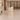 Ivory fluted reception counter in the same furnished visitor lobby, exact side view