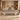 Taupe executive desk with bilateral storage and quilted corner panels in a furnished private office, front view