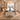 Black and white conference table with panel supports in a furnished meeting room, side view