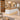 White marble and natural wood reception counter with raised privacy rim in a furnished office, 45-degree view