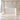 White curved fluted reception counter with a warm LED-lit base in the office, full room view