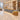 Gray stone and light oak reception desk with LED lighting for two staff in a furnished office, 45-degree view