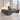 Lurpes red walnut and dark gray executive desk in a limestone office, elevated camera view