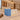 Powder blue and terrazzo reception desk with display niche in a furnished office, 45-degree view