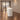 Lurpes ivory curved reception counter in a taupe office lobby, lower camera view