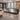 Modern Reception Desk with Stainless Steel & Transaction Counter, office scene right front view, camera angle 45 degrees