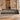 Taupe and charcoal executive desk in a gray office, low front view