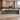 L-Shaped Executive Desk with Dual-Tone, Side Storage & File Drawers  — front view in a commercial office