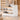 Curved Reception Desk 47-59 in Wide with Cable Management, LED Lighting & File Drawers - AI-generated setting, 45-degree view