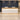 Oak and white rectangular reception desk in hotel lobby - front view