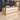 Oak and white rectangular reception desk in hotel lobby - 45 degree view