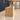 Oak and white rectangular reception desk in hotel lobby - side view