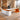 White and orange executive desk in the same office, 45-degree view