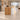 Oak and white marble reception desk in the same office, side view