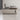 Champagne and graphite executive desk in the same office, side view