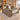 Gray-brown wood executive desk with silver edge in the same office, 45-degree view