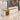 Oak and white marble reception desk in office - 45-degree view