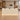 Cream fluted curved reception desk with base lighting in an office, front view