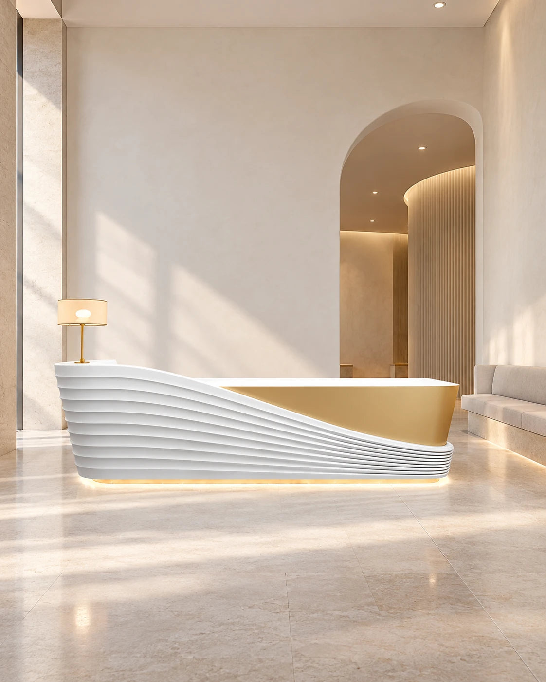 A sculptural white-and-gold reception desk in a quiet, warm-toned lobby